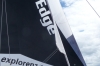 Pulling down the spinnaker on "On The Edge" catamaran NZ