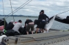 Pulling down the spinnaker on "On The Edge" catamaran NZ