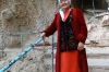 Lady in Kyrgyz dress. Twin Waterfall (Vodapad), Arslanbob KG