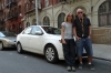 Bruce & Thea with hire car in Harlem, NY. End of the road journey.