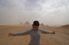 Thea battling the sandstorm at the Pyramids of Giza EG