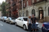 Bruce & Thea with hire car in Harlem, NY. End of the road journey.