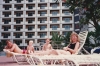 Stainsby family at the swimming pool at the Weston Stamford Hotel, Singapore
