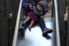 Brianna and Dolly on the slide at the Wasserturm Platz, Berlin DE