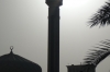 Minaret tower in government buildings beside the Dubai Creek AE
