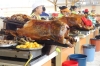 Roast pork is a specialty in the market in Gulaceo EC