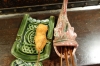 Eating fried morsels in Kyoto (station), Japan.  Chicken gizzrds.