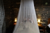 Bruce cocooned in his mosquito net. Helmeringhausen Hotel, Namibia