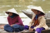 Local Hoi An people on the Thu Bon River, VN