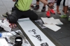 An entertaining signwriter in Inso-dong Seoul, during the Chuseok Mid Autumn Festival (aka Korean Thanksgiving Day) KR