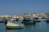 Colourful boats in the harbour of Marsaxlokk, Malta