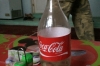 Coke bottles are reused in many places, near Davaza Gas Crater TM