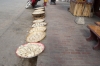 Little boy just had to wee beside the drying rice cakes on Th Sakkarin, Luang Prabang LA