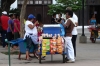 Vendors in Central Park, ring bells to advertise their wares, Leon NI