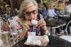 Thea tries a Beignet, speciality of New Orleans LA