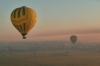 Ballooning over Valley of the Kings, Luxor EG.  Smoke haze from burning the sugar cane fields after cropping.
