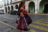 Young girls selling homemade crafts in the street