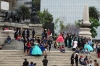 Bridal parties on the steps of the Monumento a la Independencia, Mexico City