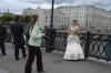 Young, freezing bride on the Luzhkov Bridge. Moscow RU
