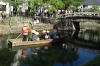 Tourists on the canal in Kurashiki, Japan