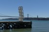 Abril 25 bridge and Sculpture 'Central Tejo' by Pedro Cabrita Reis (2017), Belēm PT