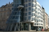 Gehri's Dancing House on the Vltava River in Prague CZ.  Originally named Fred and Ginger (after Fred Astaire and Ginger Rogers) - the house vaguely resembles a pair of dancers