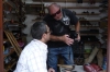Bruce shows of his photoraph to a cobbler in the Artesian Market in Safranbolu TR