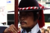 Colourful changing of the guard ceremony in front of Deoksugung Palace, Seoul KR