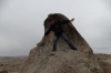 Our guide Fazil "surfing" on rock formations, near Samarkand UZ