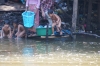 Family bath time in the Siem Reap River