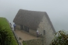 Grain storage building. A wet day in Machu Picchu PE