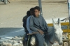 Young Egyptian boys show off at a rail crossing stop